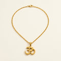 Collier pendentif ॐ « Om » en acier inoxydable, modèle 3, doré