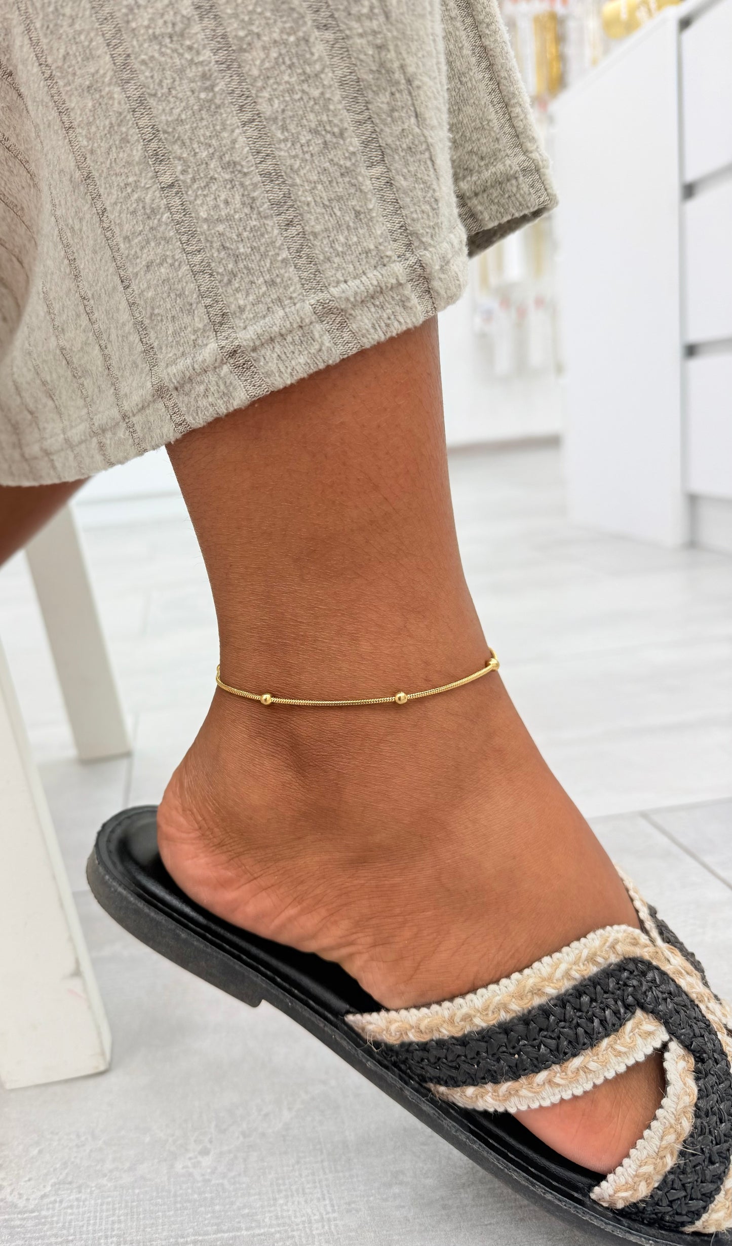 CHAINE DE CHEVILLE SERPENT DOREE AVEC BOULE